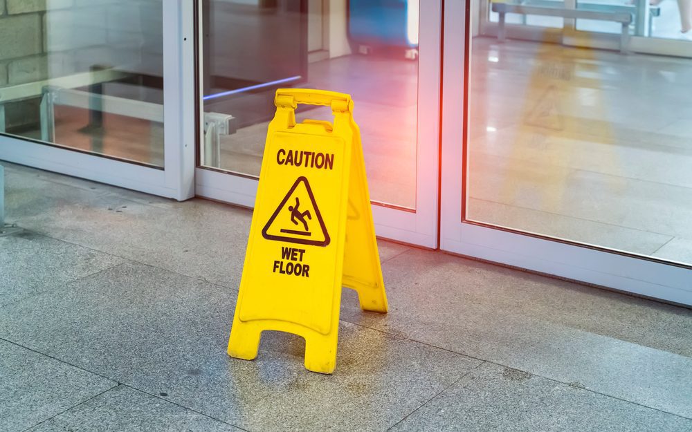"Caution wet floor" sign in mall.
