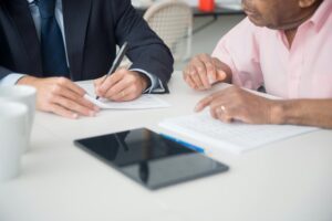 Personal injury lawyer discussing a slip and fall case with a client.