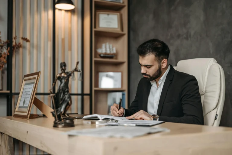 Babaians Law Firm slip and fall lawyer reviewing case documents with client.