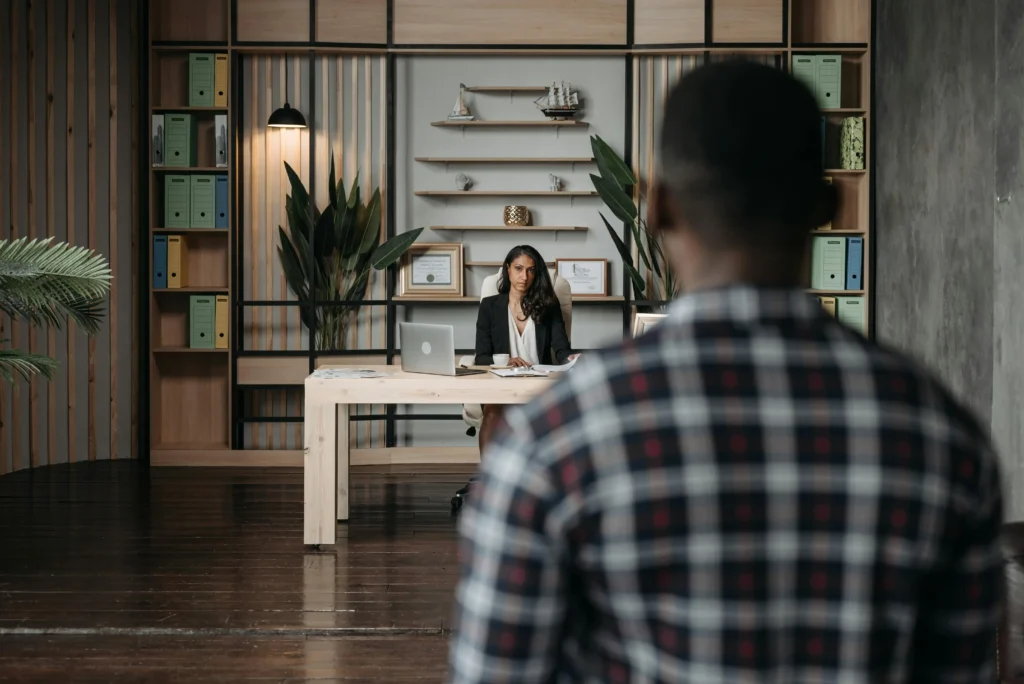 Injured visitor on unsafe property in Universal City speaking with a premises liability lawyer.