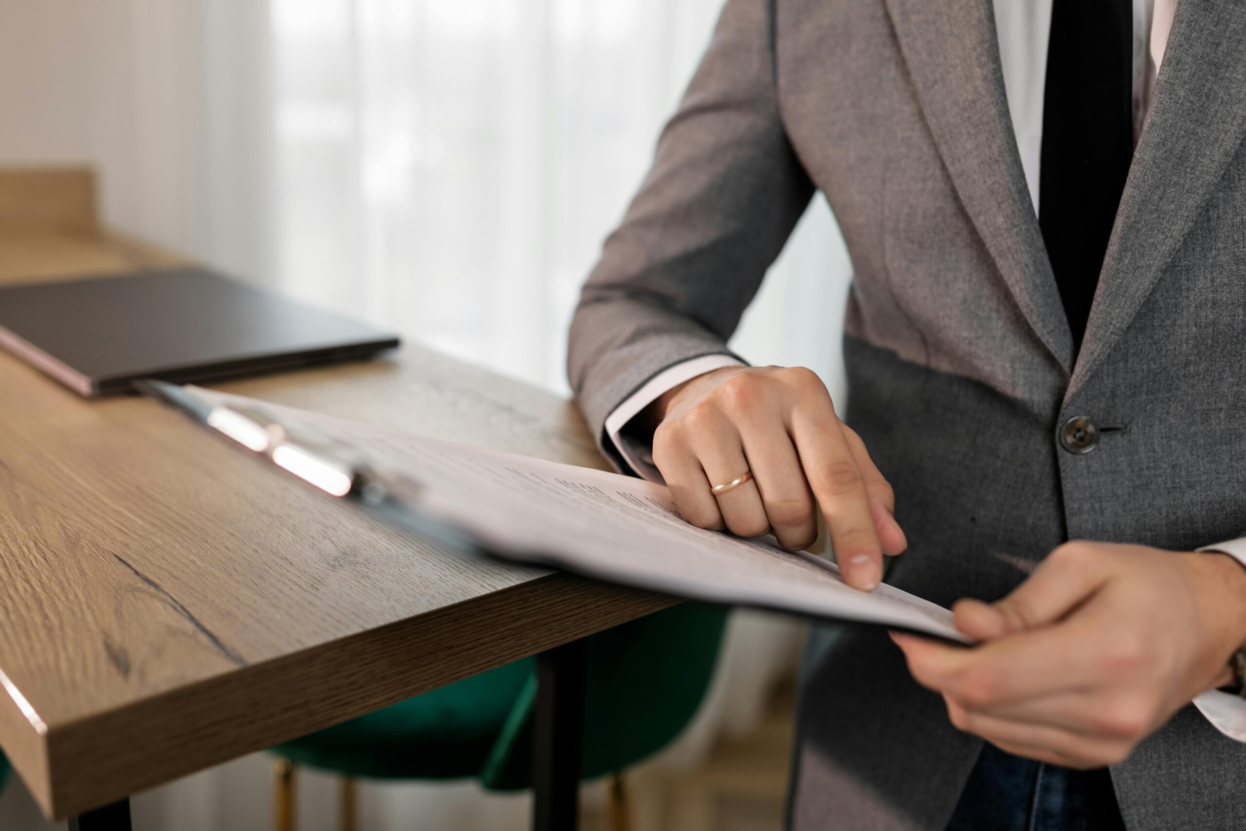 Attorney checking paperwork related to a semi truck accident claim in California.