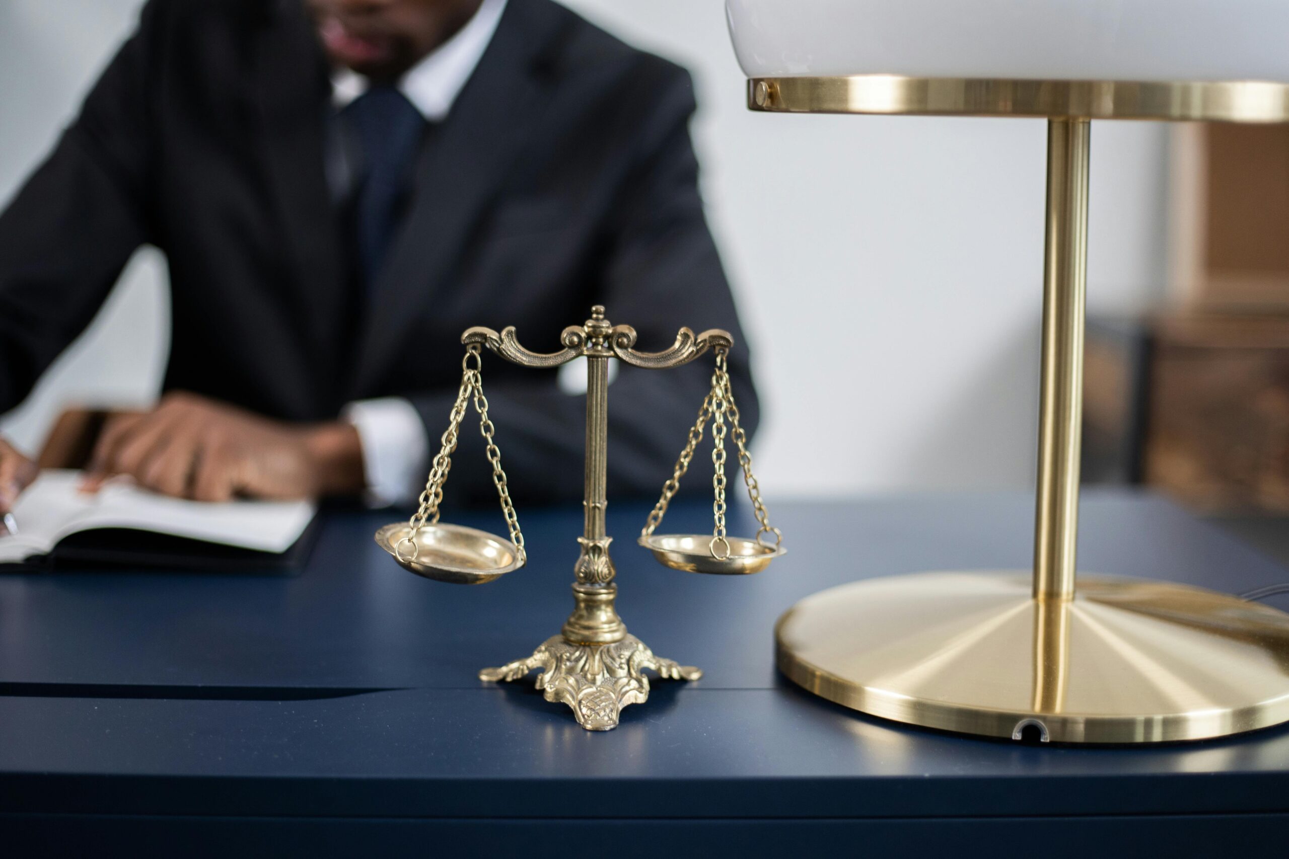 California car accident lawyer working at desk on a client’s case.