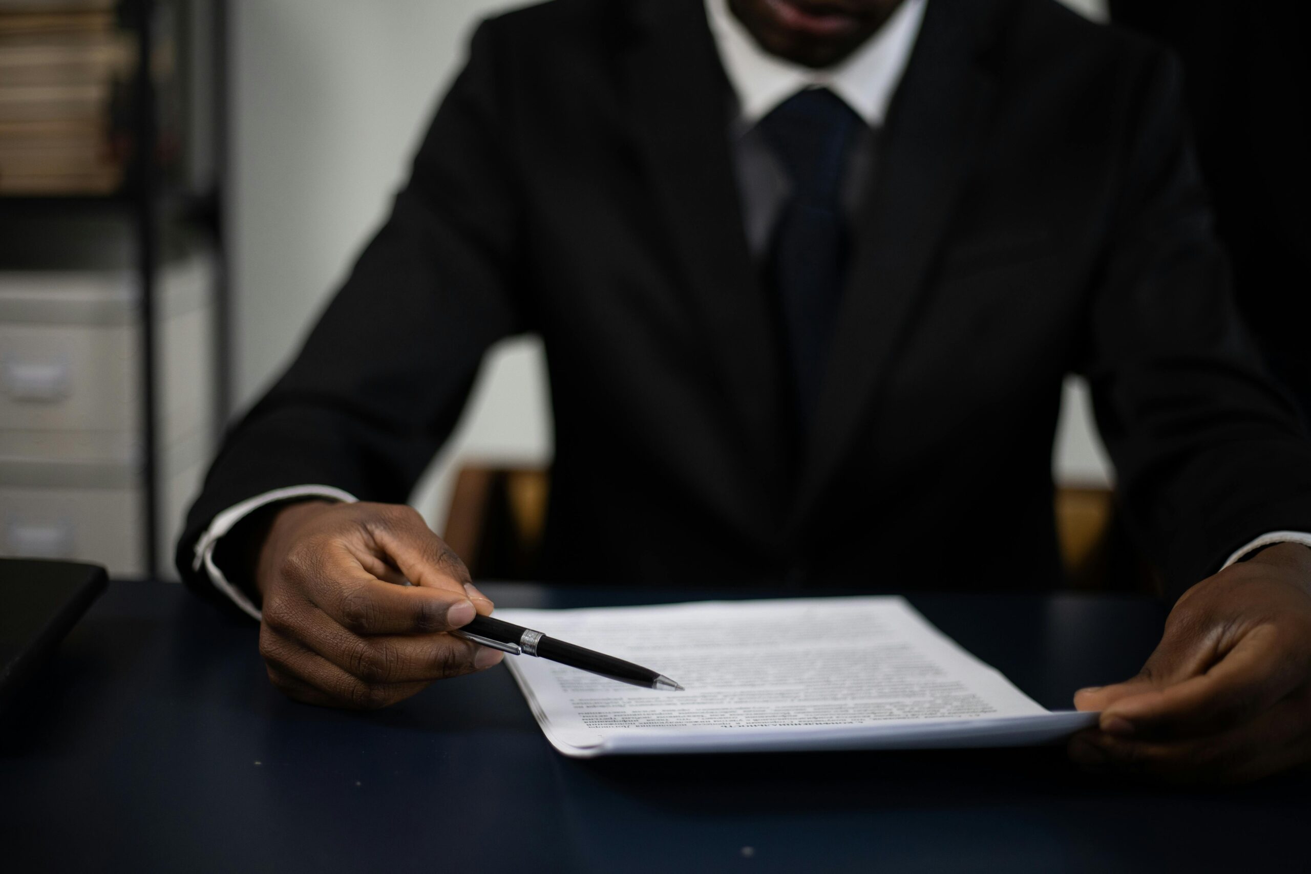 California semi truck accident lawyer reviewing legal documents for a client.