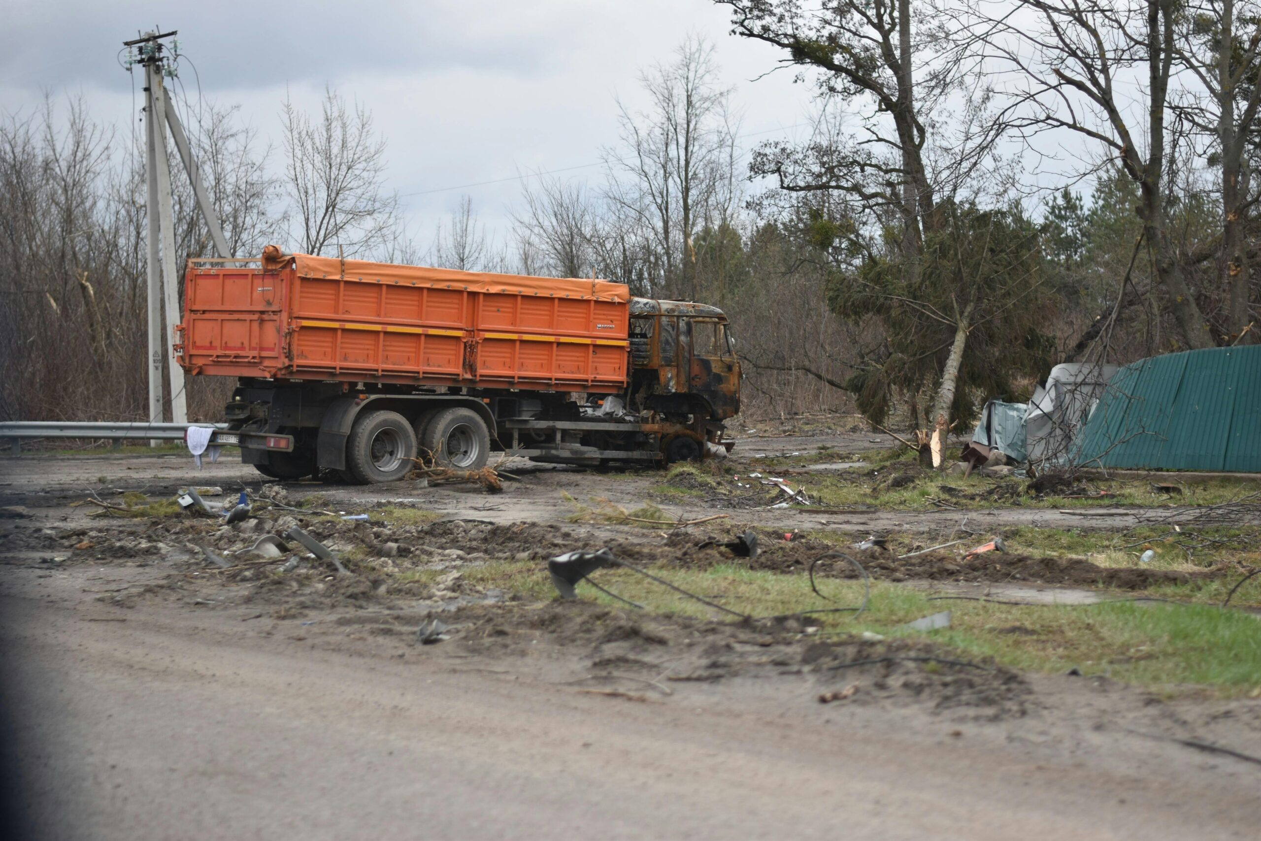 Damaged truck at accident scene in California, subject of legal claim.