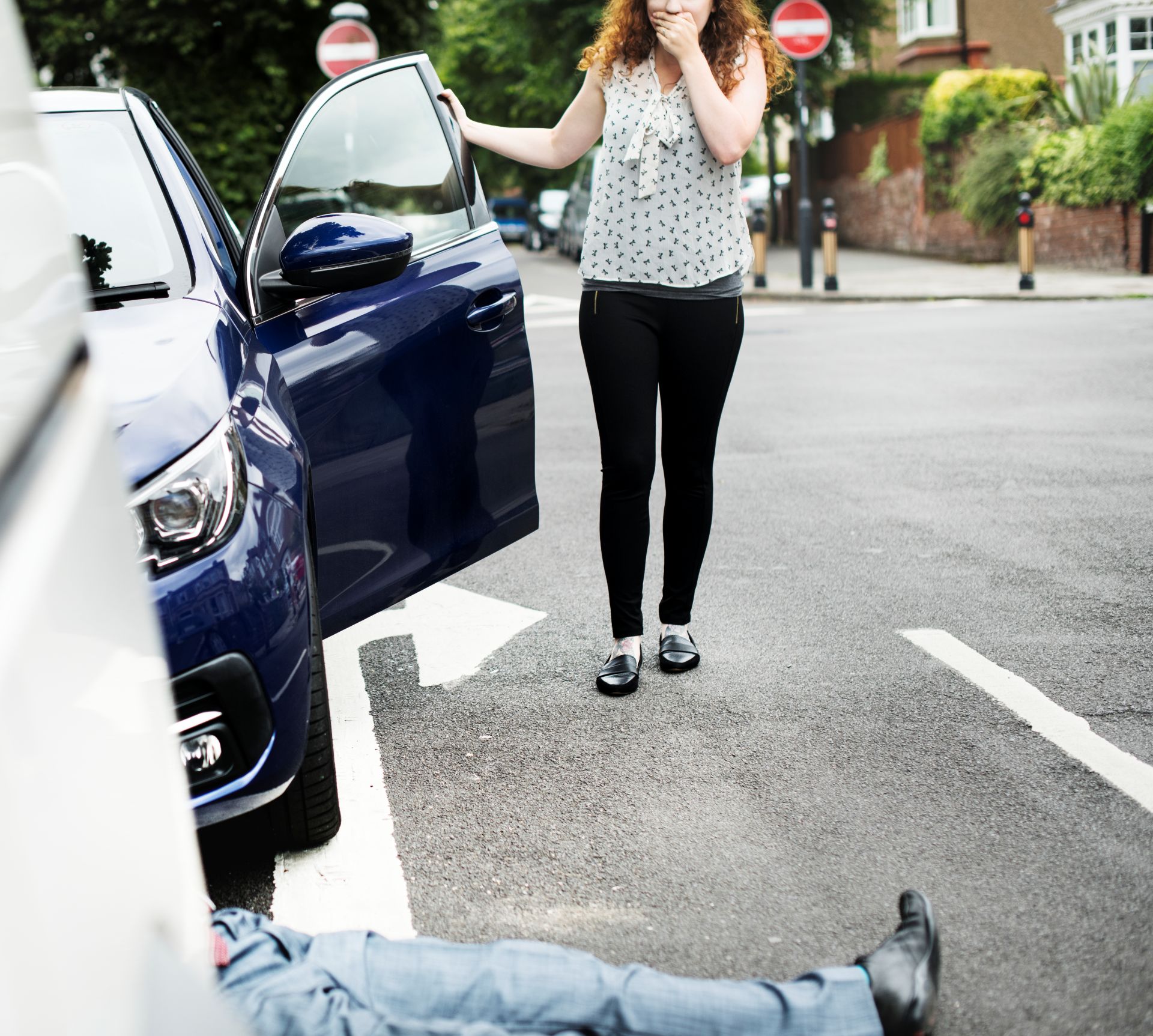 Pedestrian injured in a roadway collision with a vehicle, illustrating a Sacramento pedestrian accident case and driver liability claim.