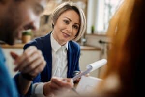 Ontario personal injury lawyer meeting with clients during a legal consultation to discuss accident claims and injury compensation.