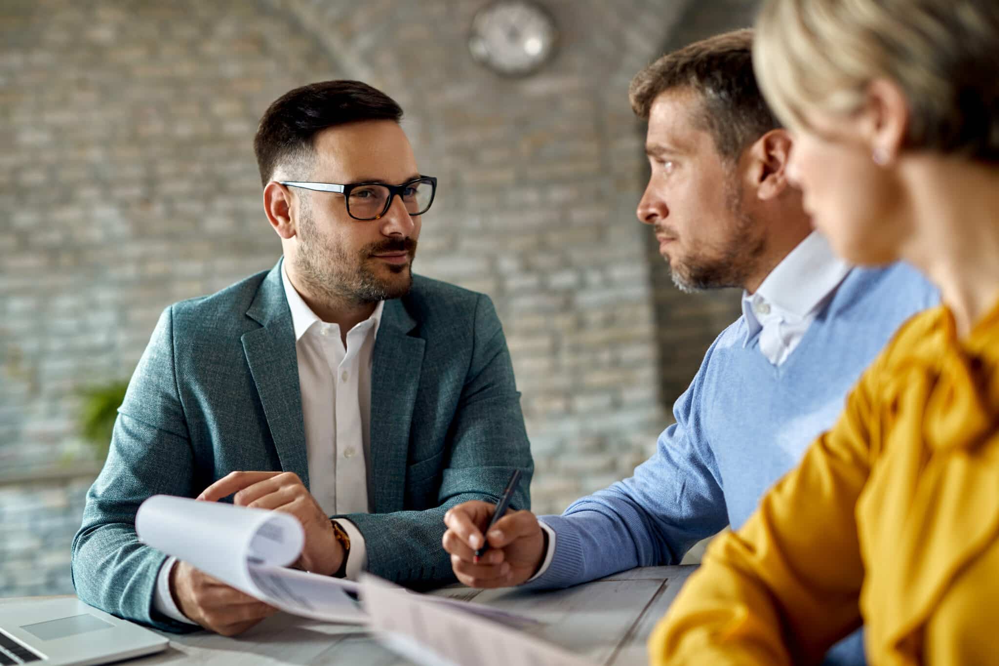 Car accident lawyer consulting with an injured client and family about legal options after a California traffic accident in San Jose.