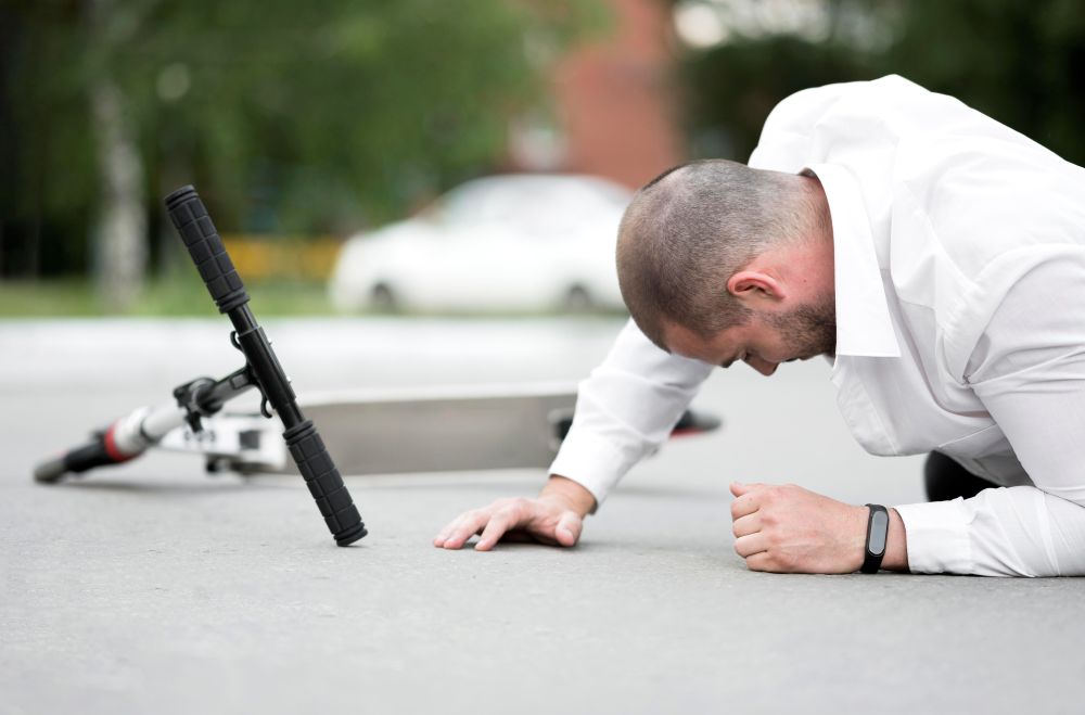 Injured woman reacting after a slip and fall accident, representing personal injury claims and average slip and fall settlements in California.