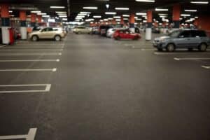 Nearly empty parking lot where vehicle accidents commonly occur, representing insurance coverage for parking lot accidents in California.